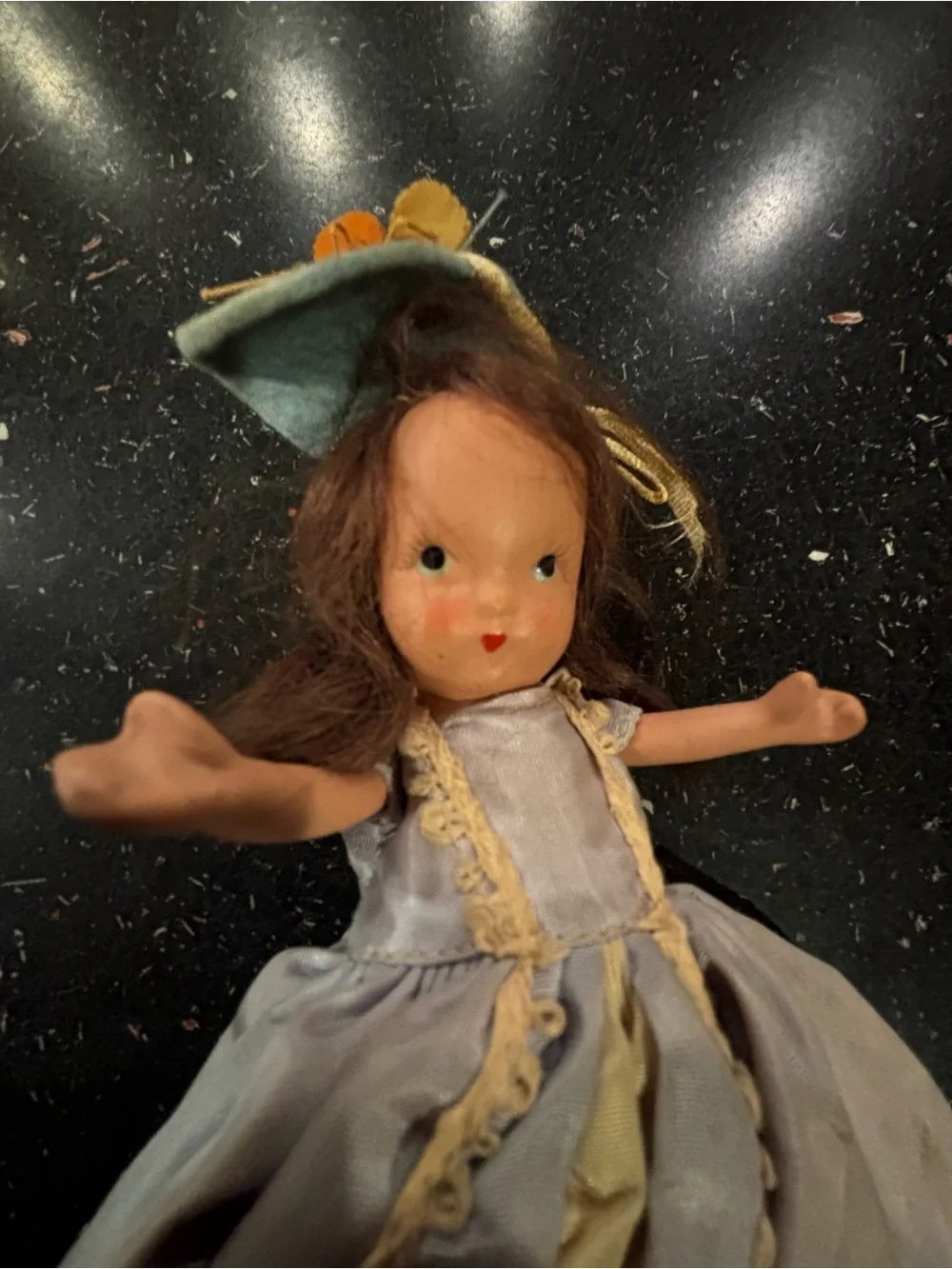 Vintage NaPorcelain Doll in Pale blue and Gold Gown labeled “Storybook doll